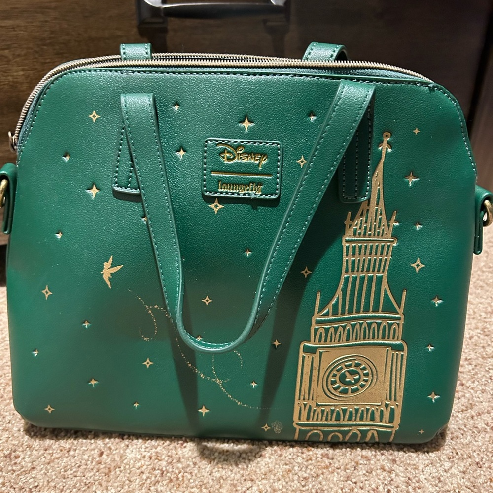 Like new green Peter Pan, Big Ben, and Tink Loungefly purse.